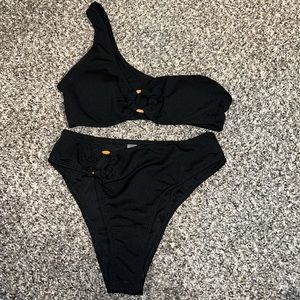 One shoulder black bikini with wood ring details